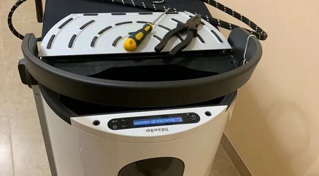 как включить автоматическое удаление накипи в гладильной машине Miele